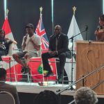 Panel of speakers on stage at the ACBN Legacy Symposium