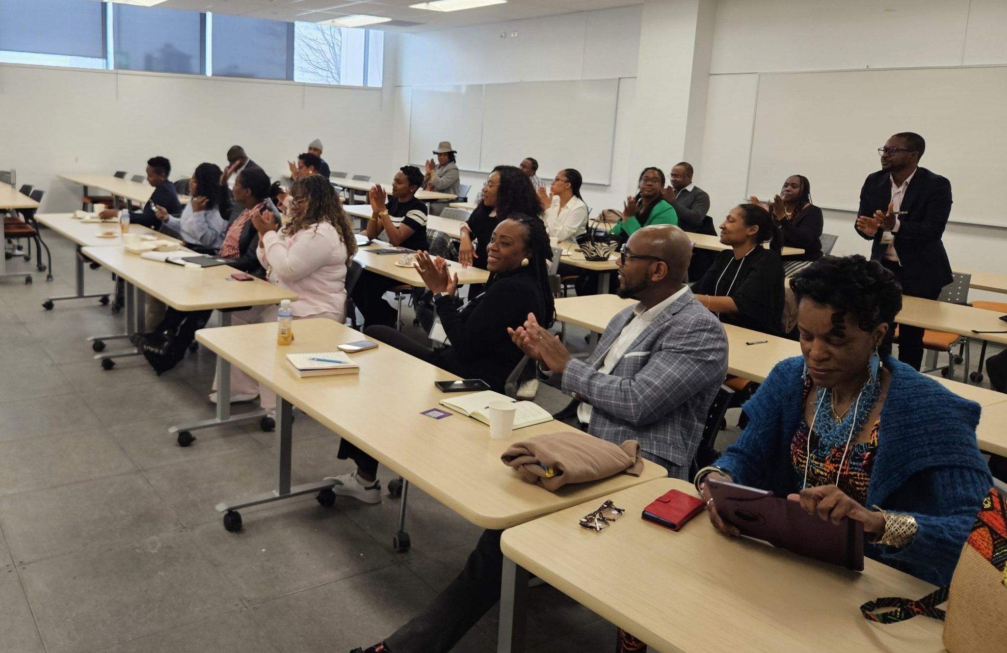 ACBN Legacy Symposium guests listening to a presentation